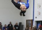 Millie Klefsaas is surrounded by the Staples Motley boys basketball team and other students who cheered her on to the state gymnastics meet. This is Klefsaas’ fourth year competing with the Brainerd Warriors. She is a team captain and was conference champion on beam and floor. She was all conference four events.