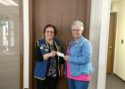 The Leader Lions donated $1,000 to the Motley Area Food Shelf. The proceeds were raised from the Lions annual pancake breakfast held March 19. Pictured above: Lion Deb Alexander and Sherry Frisk, Motley Area Food Shelf. (Submitted photo)