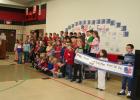 During their Veterans Day program Nov. 11, Staples-Motley Elementary School students sang songs, read essays and offered a special tribute to veterans to show their appreciation for the veterans’ service to the United States. Prior to the program, the veterans were served breakfast in the school’s cafeteria. (Staples World photo by Dawn Timbs)