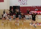 The Cardinals jump for joy when they complete their third set comeback against Walker-Hackensack-Akeley on Oct. 20. (Staples World photos by Mark Anderson)