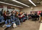 Director Nathan Thelen, far right, works with the Staples-Motley High School A Cappella Choir as they rehearse a song from Randall Thompson’s  ‘Frostiana,’ based on the poems of Robert Frost. At the piano is accompanist Sandy Paskewitz. The Choir will combine their voices with the Staples Area men’s and women’s choruses to perform this work at the Community Christmas Concert Saturday, Dec. 7, at 7 p.m., at Centennial Auditorium in Staples. (Staples World photo by Dawn Timbs)