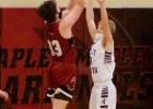 Dominic Gomez scores a basket in a game earlier this season.