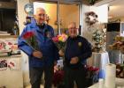 Ray Garland, left, and Jim Hofer worked a shift at the rose sale, an annual fundraiser for the Staples Rotary Club.  “We appreciate everyone who purchased roses,” they said. Proceeds support local scholarships, youth leadership camp and other local and international civic projects. Funds also support the Global Polio Eradication Initiative. (Submitted photo)