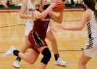 Addison Lorber gets to the basket past two defenders.
