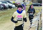 Audrey Brownell runs through a strong wind and below freezing temperatures at the NXR Heartland Rising Stars race. (Submitted photos)