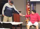 Staples Police Officer, Jacob Maros  offers a hand, to a character actor Linda Flanders, to help her off a bridge railing. This is in a training scenario, where Flanders is also the instructor for the course. Character actors helped guide officers to deal with people in crisis situations. (Staples World photo by Mark Anderson)