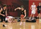 Isaiah Schultz takes off on a fast break after getting a steal against Pequot Lakes, with Luke Brownell running with him, leaving downed players including his teammate Avandre Brandt. (Staples World photos by Mark Anderson)