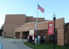 A number of students gathered outside Staples-Motley Middle/High School to spend about a half hour in prayer prior to the start of school Sept. 23. This was in conjunction with the national “See You at the Pole” event, an annual student-led prayer gathering at the school flag pole. The event in Staples was organized by the local chapter of Fellowship of Christian Athletes (FCA). (Staples World photo by Dawn Timbs)