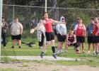 Noah Larson draws an audience to watch his discus throw. (Staples World photos by Mark Anderson)