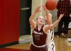 Izzy Olander boxes out while pulling in a rebound in the game against Pillager. (Staples World photos by Mark Anderson)