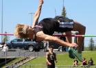 Sailing over the bar Hunter Miller clears six feet, one inch, to qualify for state.
