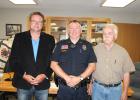 Jason Borash (center) was promoted to Police Chief for the Motley Police Department (MPD) on Aug. 13. He is pictured with Mayor Al Yoder (left) and council member Pat O’Regan, who also serves as the council liaison to the police department. (Staples World photo by Dawn Timbs)