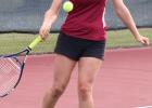Sam Schimpp swings a forehand shot against Crosby-Ironton. (Staples World photo by Mark Anderson)