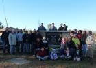 The family of the late Ernie Converse, along with representatives of the City of Motley and others, gathered recently at the Motley park named in his honor to celebrate the completion of the newly constructed granite sign. Pictured front row from left: Morgan Converse, Riley Myrum, Payton Converse, Brooke Converse. Seated in front of sign: Jodi Backberg, Judy (Converse) Marsh, Ernie’s daughter; Debby Converse, Ernie’s daughter-in-law; Larry Converse, Ernie’s son. Standing to right of sign: Miranda Converse,