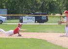 Ben Tyrrell sprawls to toss the ball for an out at second base.