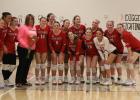 For “Dig Pink” night, the volleyball team honored teacher Dawn Weite, who is undergoing cancer treatments.