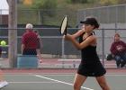 Maddison Perius blocks a backhand volley back to her opponents in the playoff win against Parkers Priarie (Staples World photos by Mark Anderson)