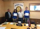 Staples-Motley High School students Andrew Bates and Sara Oberlander attended Camp RYLA, a Rotary Youth Leadership Award camp, this summer. They attended a recent meeting of the Staples Rotary Club, their sponsors to attend the camp, to receive participation certificates. From left are Rotarian Chuck Mayer, Oberlander, Rotarian Al Kolling and Bates. (Staples World photo by Brenda Halvorson)
