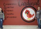 Crystal McGruder and Kayla Vejtasa are behind the window painting project at Staples-Motley Elementary School. (Submitted photos)