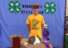 Sam Sauber of Motley took home the overall Grand Champion Breeding Rabbit award for his Dutch rabbit Rog at the state fair. He also won the champion award for his breed (Dutch). Sauber is a member of the Becker Busy Bees 4-H Club. (Submitted photo)
