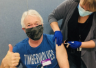 Tim Ludwig, a nurse at Todd County, was excited to receive his first dose of the COVID-19 vaccine from nurse Ronni Turchin. (Submitted photo)