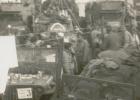 The view inside a landing craft in the English Channel, approaching Normandy on the D-Day invasion. Note the crowded masses of men, vehicles, and equipment. Photo courtesy of James  R. Lambeth, Plainview, Ill.