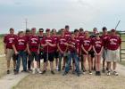 Cardinal trapshooters, front row, Gabe Kroll; row two, from left, Drake Dukowitz, Odin Trif, Ethan Daly, Nate Nyhus, Reid Judd, Ronnie Noska, Abbie Brichachek and coach Bob Koenig; row three, coach Steve Benson, William Thew, Ryan Larson, Dominic Carlson, Cole Winkels, Keith Rollins, Alex Black and Kris Taylor. (Submitted photo)