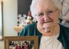 Phyllis Paskewitz, Staples, holds a photo of her and her husband, Bob, along with former President Jimmy Carter and his wife, Rosalynn, following a Sunday School class at the Carter’s church in Plains, Ga., taught by Pres. Carter. The photo, taken about 20 years ago, means a lot to Paskewitz and brings back wonderful memories of this once-in-a-lifetime experience she shared with her late husband. (Staples World photo by Dawn Timbs)