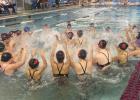 The Staples-Motley/Verndale swim team gets their team and the crowd fired up with a pre-meet splash ritual on Oct. 10. The Cardinals packed the pool with their largest crowd of the season. (Submitted photo)
